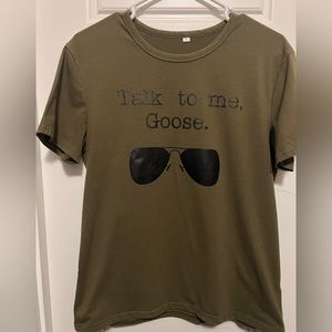 Olive green graphic T-Shirt. Runs small. Fits like size M.